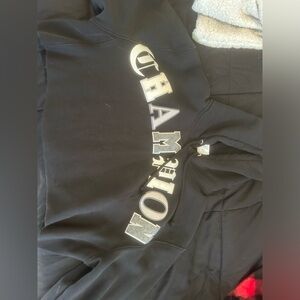 champions , size medium, black